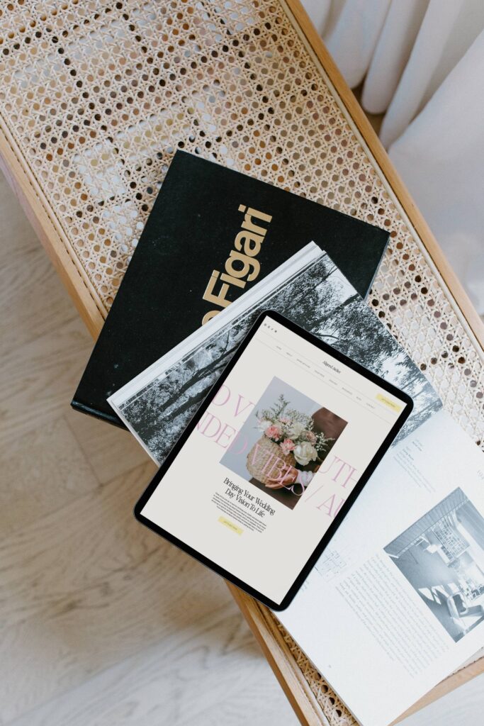 Tablet with custom floral website on screen